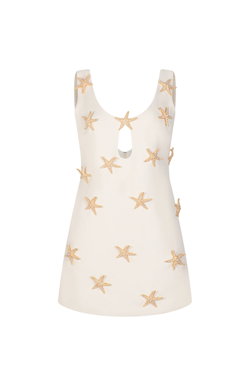 Valenciani Starfish mini dress in ivory, featuring a stylish short design with elegant detailing, perfect for summer occasions.