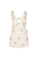 Valenciani Starfish mini dress in ivory, featuring a stylish short design with elegant detailing, perfect for summer occasions.