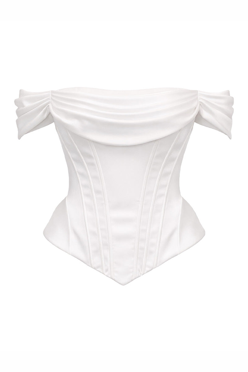 White Valentia co-ord set by Gigii's featuring a fitted top and matching skirt, styled for a chic, coordinated look.