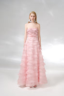 Light pink strapless gown from Happy Clothing, elegant formal dress with flowing fabric and fitted bodice for special occasions.