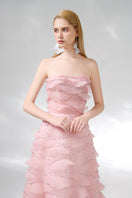 Light pink strapless gown by Happy Clothing, elegant formal dress with flowing fabric and fitted bodice, suitable for special occasions.
