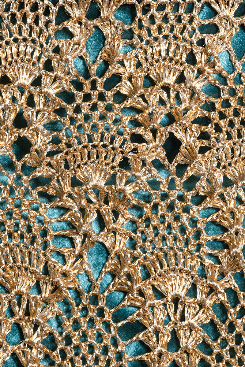 Gold emerald pineapple clutch bag by VERDI, featuring a shiny gold and green design with a textured surface.