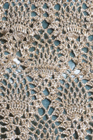 White gold pineapple clutch with turquoise accents by VERDI, featuring a sleek design and elegant closure.