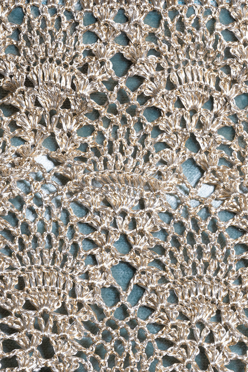 White gold pineapple clutch with turquoise accents by VERDI, featuring a sleek design and elegant closure.
