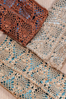 White and gold pineapple clutch by VERDI featuring turquoise accents, stylish and compact evening bag.
