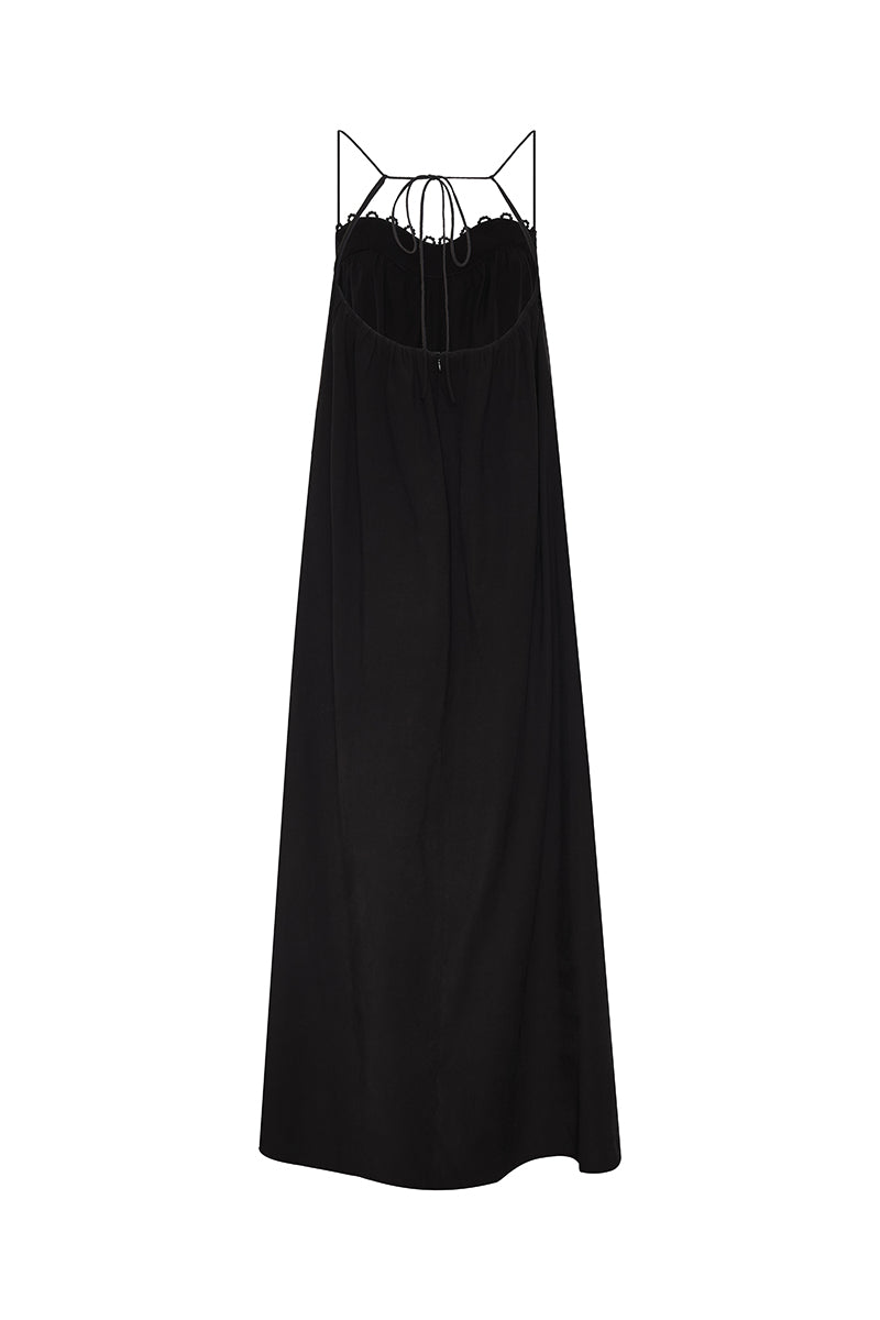 DUMA&CO Resonancia Maxi Dress in vibrant patterned fabric displayed on a hanger against a white background.