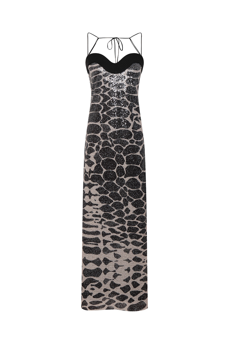 DUMA&CO Piedra Dress maxi dress in vibrant patterned fabric with flowing silhouette and sleeveless design.