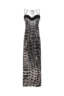 DUMA&CO Piedra Dress maxi dress in vibrant patterned fabric with flowing silhouette and sleeveless design.