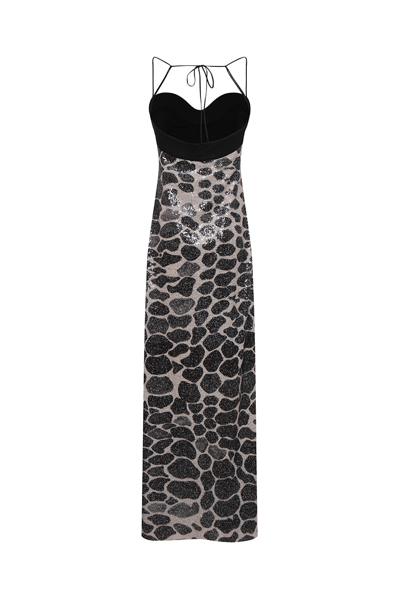 DUMA&CO Piedra Dress maxi dress with flowy fabric, floral pattern, and sleeveless design perfect for summer wear.