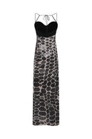 DUMA&CO Piedra Dress maxi dress with flowy fabric, floral pattern, and sleeveless design perfect for summer wear.