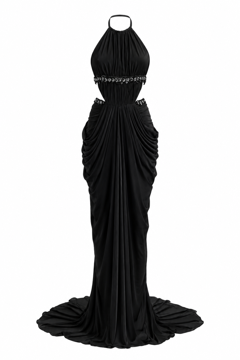 Black VEYA gown by Francisco Arce, featuring elegant fabric and a flowing silhouette, displayed on a dress form.