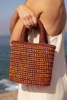 Mara Brazil orange VIDA top handle bag with sleek design, featuring a structured shape and stylish handle for versatile carry.