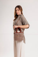 Mara Brazil VIDA brown top handle bag with structured design and sleek leather finish, perfect for stylish everyday use.