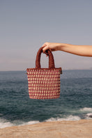 Brown Mara Brazil VIDA top handle bag with sleek design and sturdy handles, perfect for stylish everyday use.