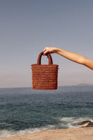Mara Brazil VIDA orange top handle bag with structured design and sleek leather finish, ideal for stylish everyday use.