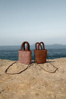 Brown Mara Brazil VIDA top handle bag with sleek design and sturdy handles, perfect for everyday use.