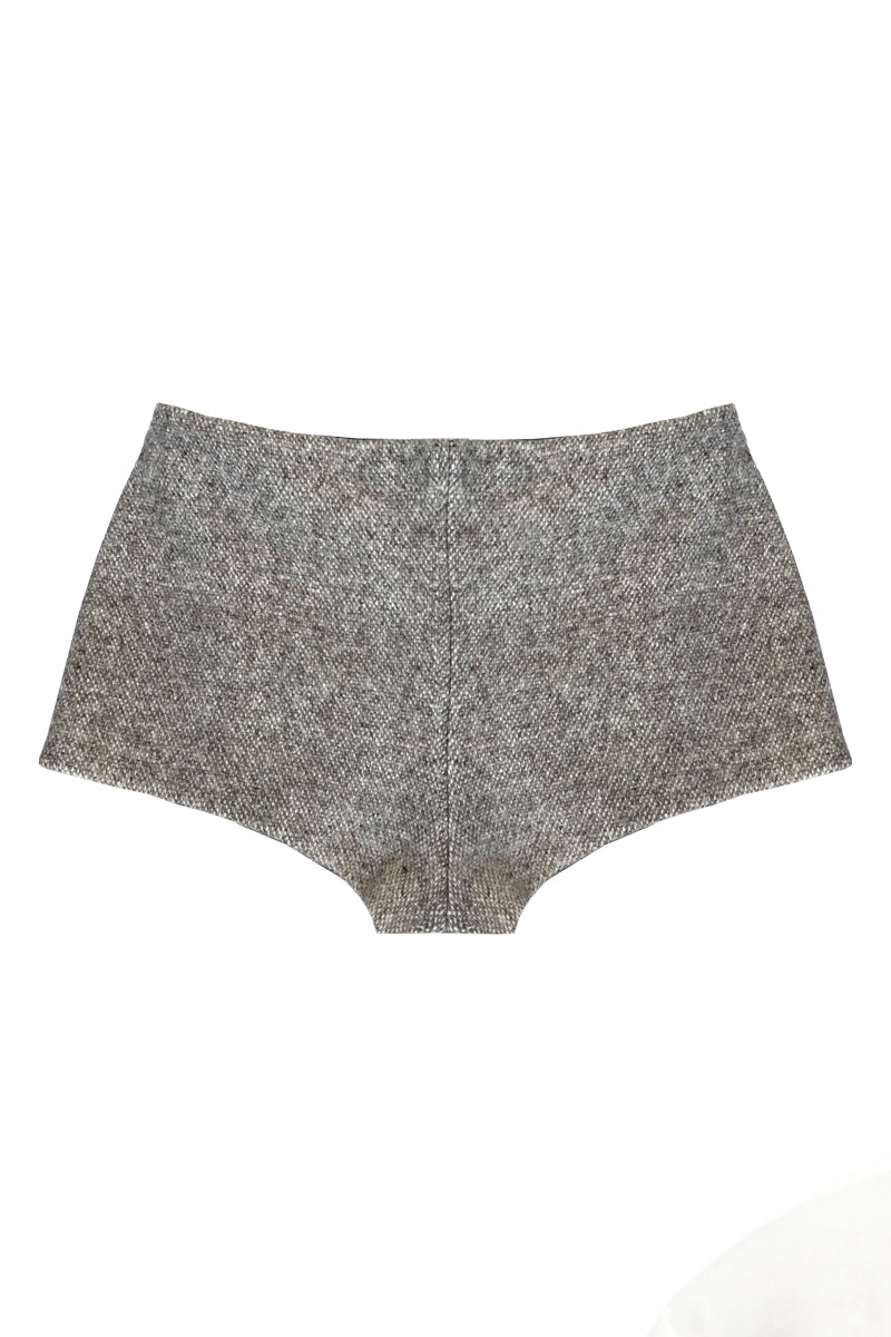 JC Pajares virgin wool culotte shorts displayed on a model, showcasing their stylish fit and cozy fabric.