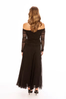 Black Valencia Maxi Skirt by Nana Jacqueline, flowing fabric with a stylish, elegant design perfect for versatile fashion looks.