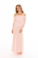 Nana Jacqueline Valencia pink maxi skirt displayed on a model, flowing fabric and elegant design ideal for summer fashion.