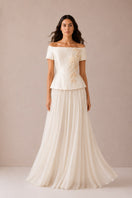 Nihan Peker Valentina vanilla maxi skirt displayed with flowing fabric and waistband detail, perfect for elegant summer looks.