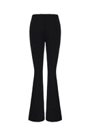 Nana Jacqueline Valeria flared black pants shown from the back view, featuring a high waist and flowing wide-leg silhouette.