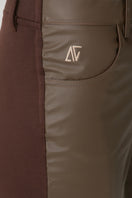 Brown vegan leather flare sweatpants by Bassigue, featuring a stylish high-waist design and relaxed fit for casual wear.