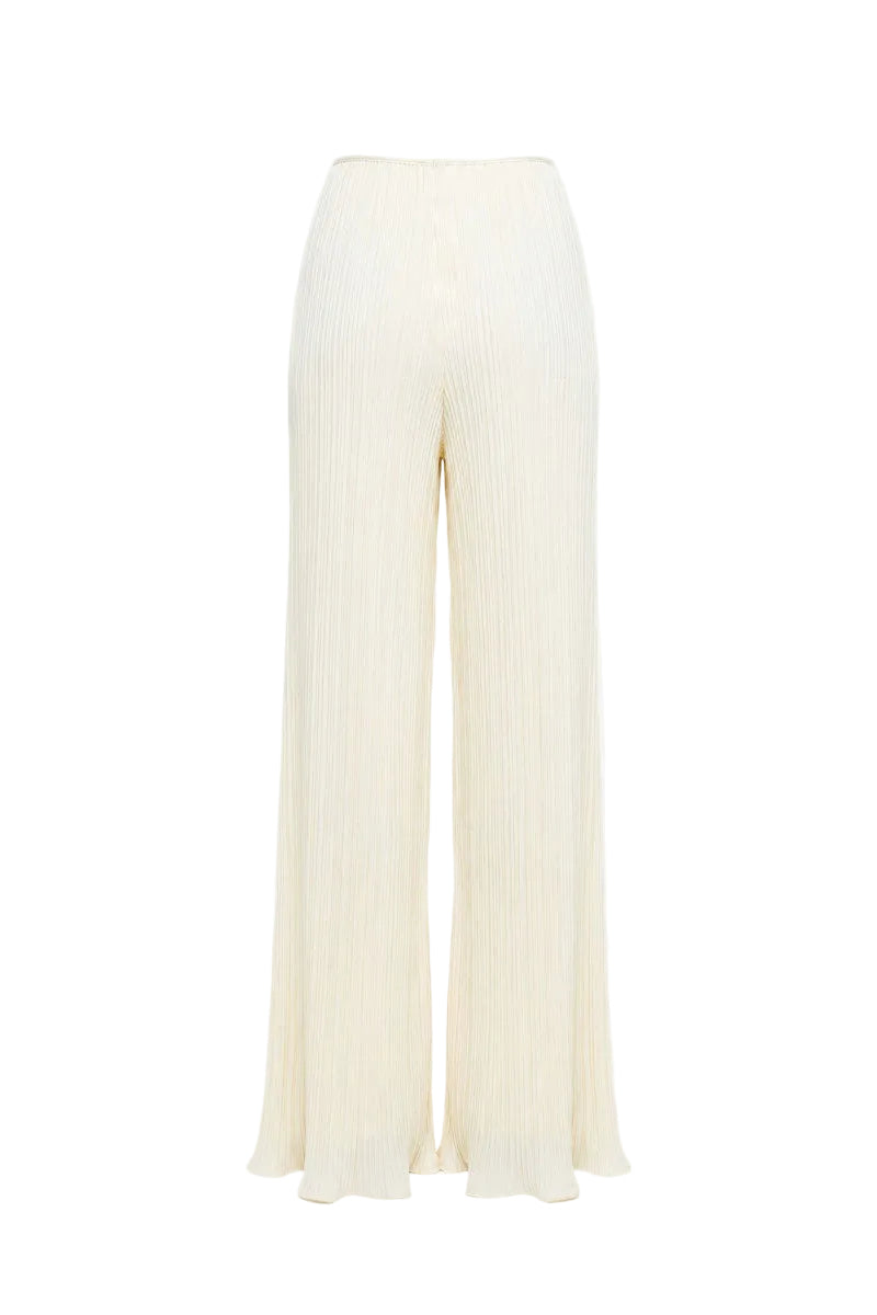 Off-white Maylé Vásquez Velo Pants laid flat, showcasing their sleek design and lightweight fabric for a stylish casual look.