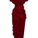 Red velvet structured gown with V-neck, petal embellishments, and dramatic shoulder details from Happy Clothing.