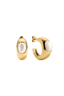 Sara Shala Venus earrings in yellow gold vermeil with intricate design, hanging from pierced ears.