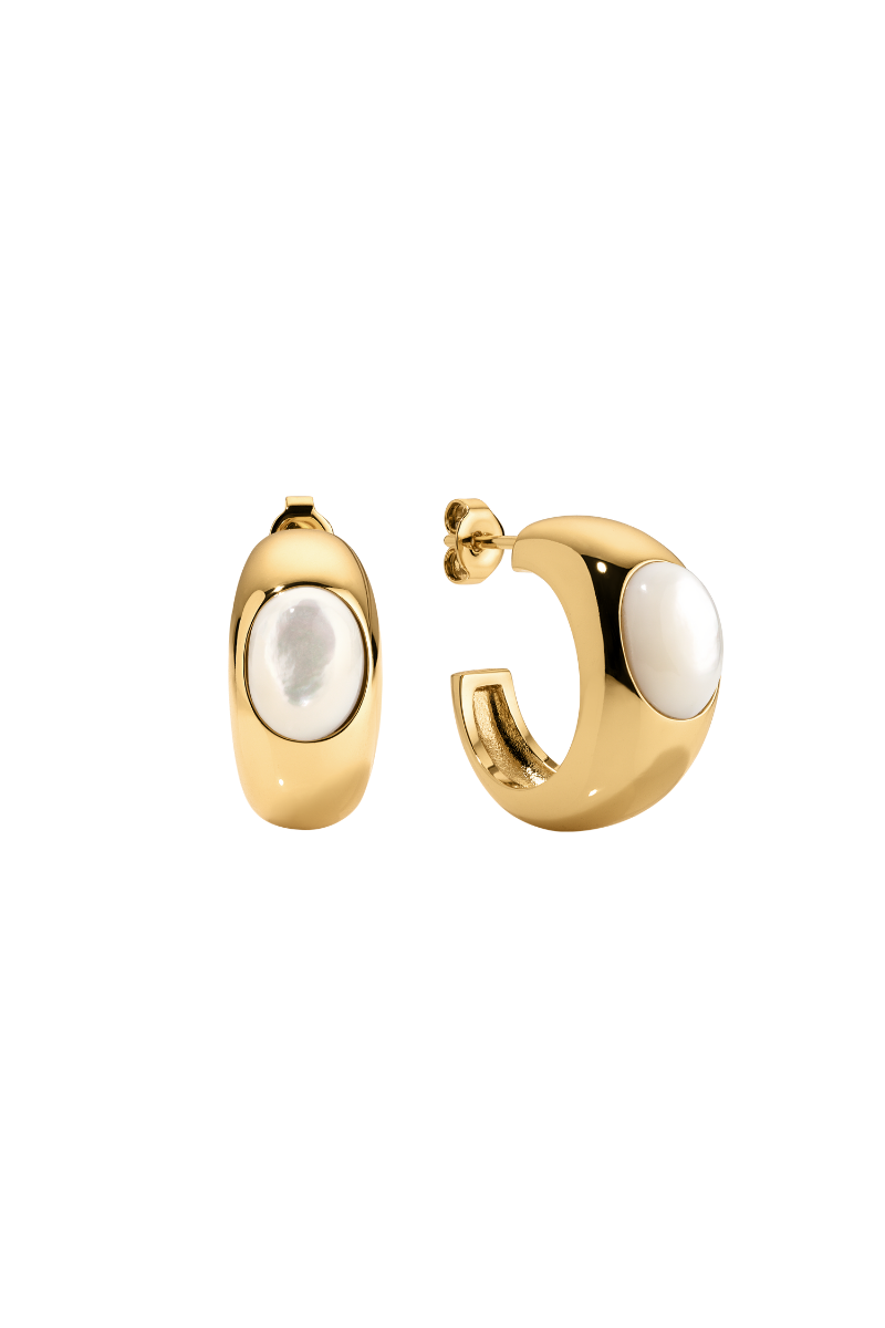 Sara Shala Venus earrings in yellow gold vermeil with intricate design, hanging from pierced ears.