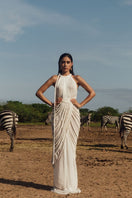 Kasia Kulenty VERRA nude maxi gown with flowing fabric, elegant design, and floor-length silhouette, perfect for formal occasions.
