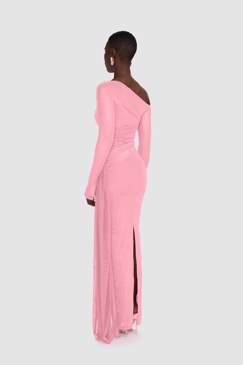 Pastel pink Verella Maxi Dress by BBXBRAND displayed on a hanger with flowing fabric and elegant design.