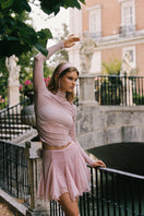 Nana Jacqueline Verena pink top, stylish women's blouse with soft fabric, showcased on a model in a fashion campaign image.