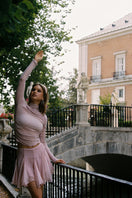 Nana Jacqueline Verena pink top, stylish and vibrant, featuring a fitted design with short sleeves and a rounded neckline.