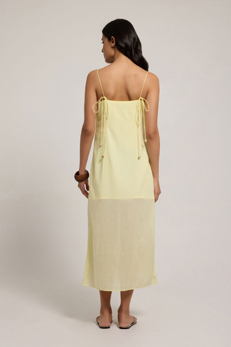 Light blue Vesna midi dress by Summer Away with floral print, sleeveless design, and flowy fabric perfect for summer occasions.