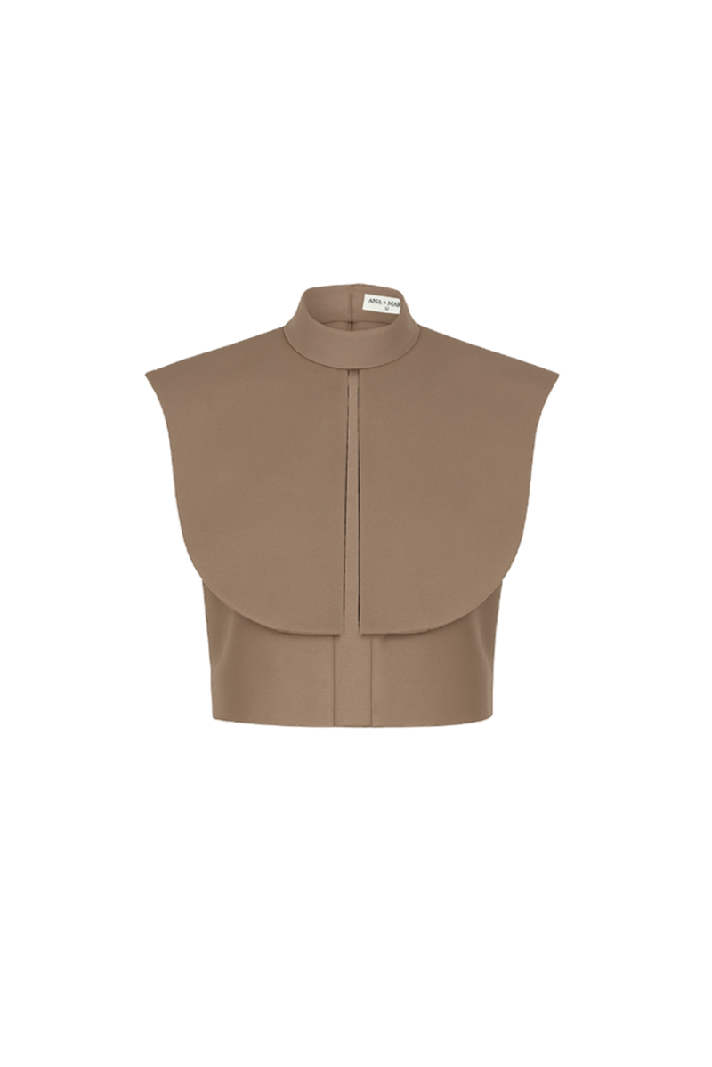 Ana + Maria Vestal cropped top in camel, featuring a stylish tan design, displayed on a model with a casual fit.