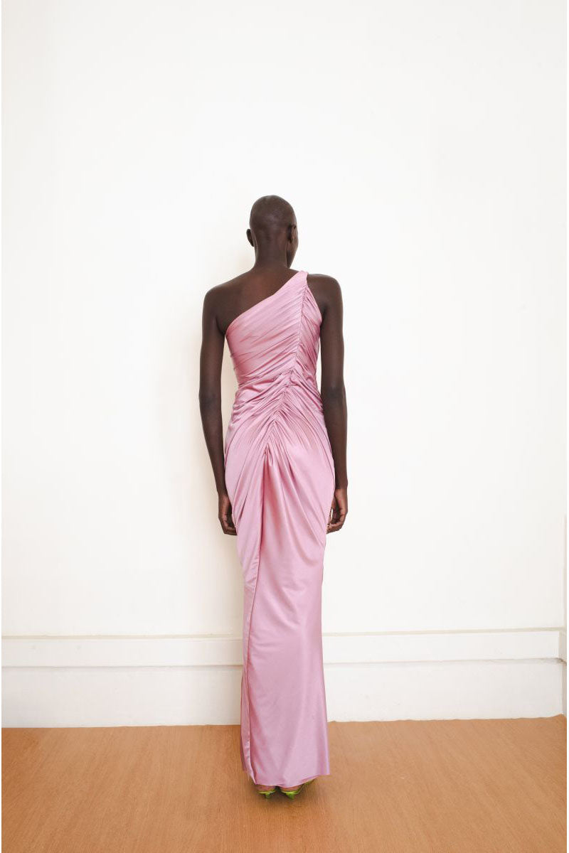 Pink Vestige gown by Yassmin Saleh, elegant maxi dress with flowing fabric, shown from the back.