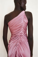 Close-up of the back of the pink Vestige gown, a YASSMIN SALEH maxi dress featuring elegant fabric and detailed stitching.