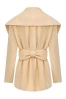 Nana Jacqueline Victoria bow coat in vibrant yellow, shown from the back with bow details and classic coat silhouette.