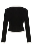 Back view of Nana Jacqueline Victoria velvet blazer in black, showing tailored fit and smooth velvet fabric.