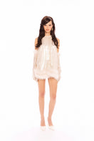 Nana Jacqueline Viola Fur Mini Dress shown on a model, featuring plush fur fabric and stylish short length for a chic look.