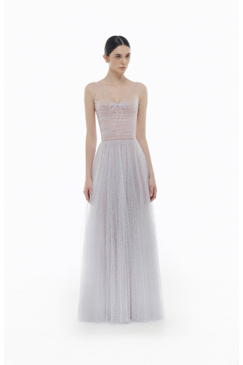 Violet V-neck draped maxi dress by Montsand, flowing fabric, elegant design, and full-length silhouette.