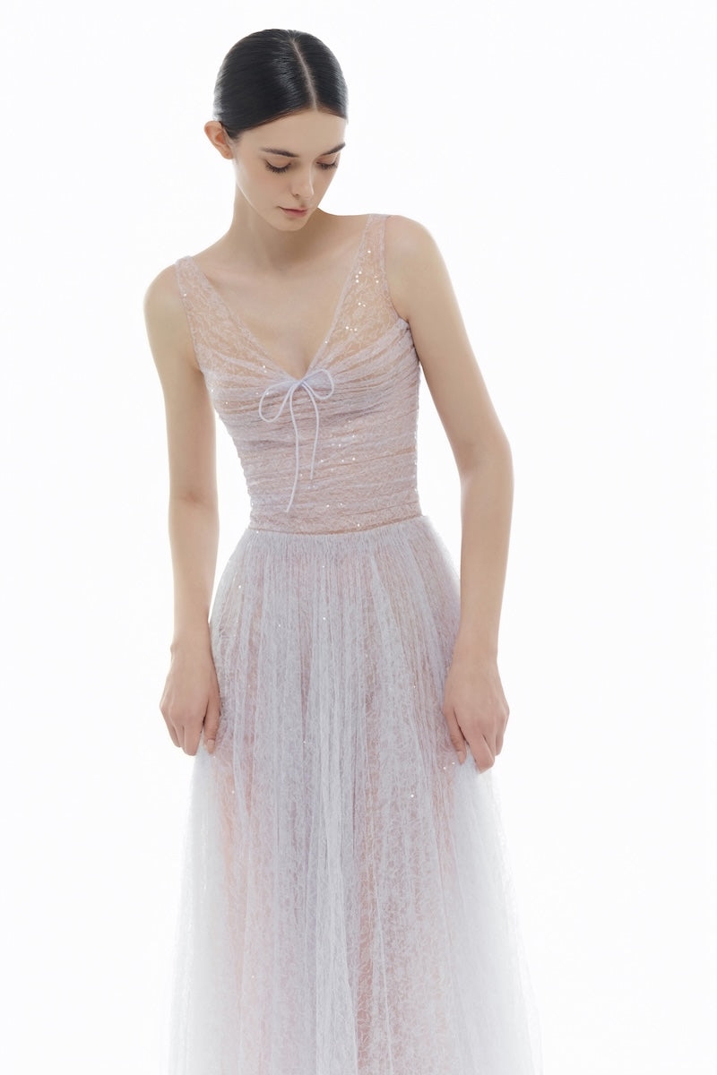 Violet V-neck draped maxi dress by Montsand, flowing fabric with elegant draping, full-length design, and sleeveless style.