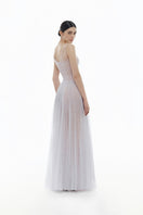 Violet V-neck draped maxi dress by Montsand featuring flowing fabric and elegant design, perfect for formal occasions.