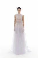 Violet smocked lace gown by Montsand featuring intricate lace details and a flowing maxi silhouette.