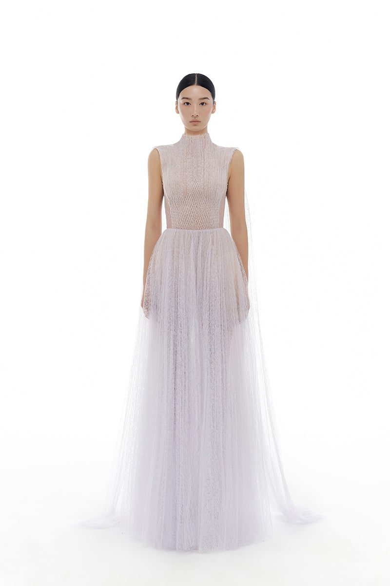 Violet smocked lace gown by Montsand featuring intricate lace details and a flowing maxi silhouette.