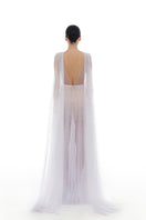 Violet smocked lace gown by Montsand featuring intricate lace details and a flowing maxi design for elegant occasions.