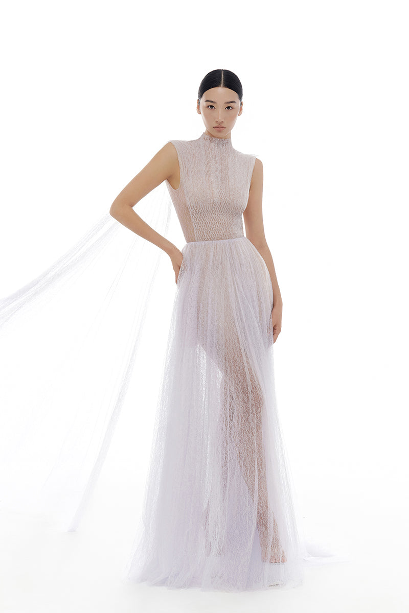 Violet smocked lace gown by Montsand featuring a flowing maxi dress with delicate lace details and a fitted smocked bodice.