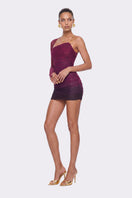 Nana Jacqueline Violetta mini dress with one-shoulder design and purple gradient fabric on a model.