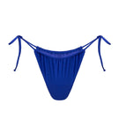 Deep blue satin bikini bottom by Suncillo, featuring a sleek, smooth fabric and stylish cut for a modern beach look.